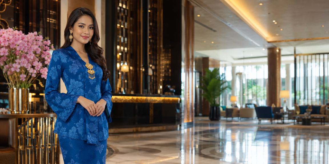 Suasana kasino hiburan Ipoh dengan pakaian tradisional baju kurung bersama logototo
